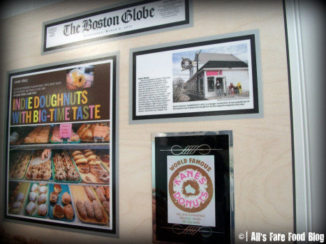 Newspaper clippings at Kane's Donuts
