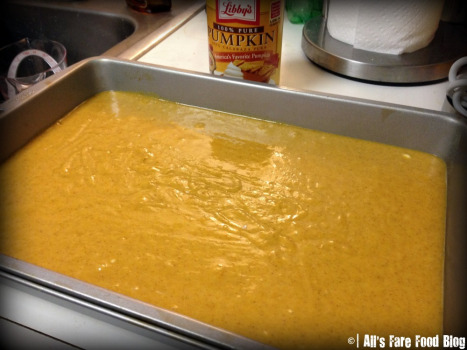 Leveling out the pumpkin mixture