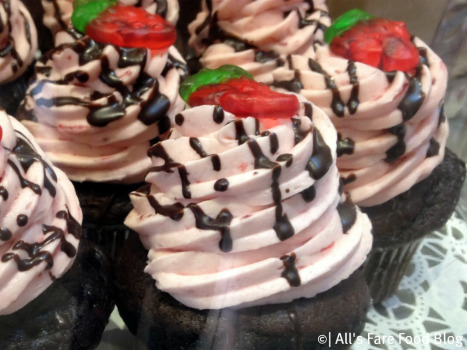 Chocolate cupcakes with strawberry frosting