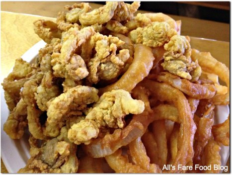 Fried clam platter with onion rings and fries at Woodman's of Essex